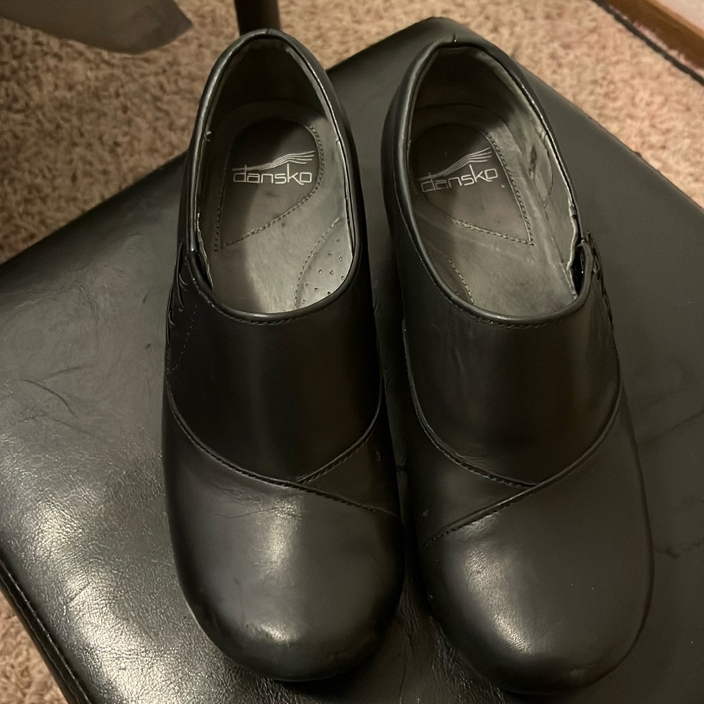 Dansko Stacie black leather clogs